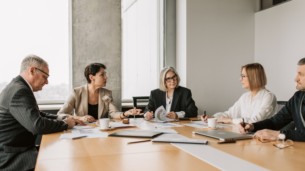 Advisor meeting with senior clients